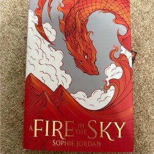 A Fire in the Sky by Sophie Jordan - Red and Gray Cover